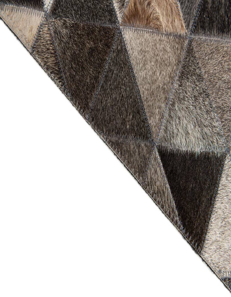 Detail image of 5' 1 x 8' 1 Cowhide Stocks Rug