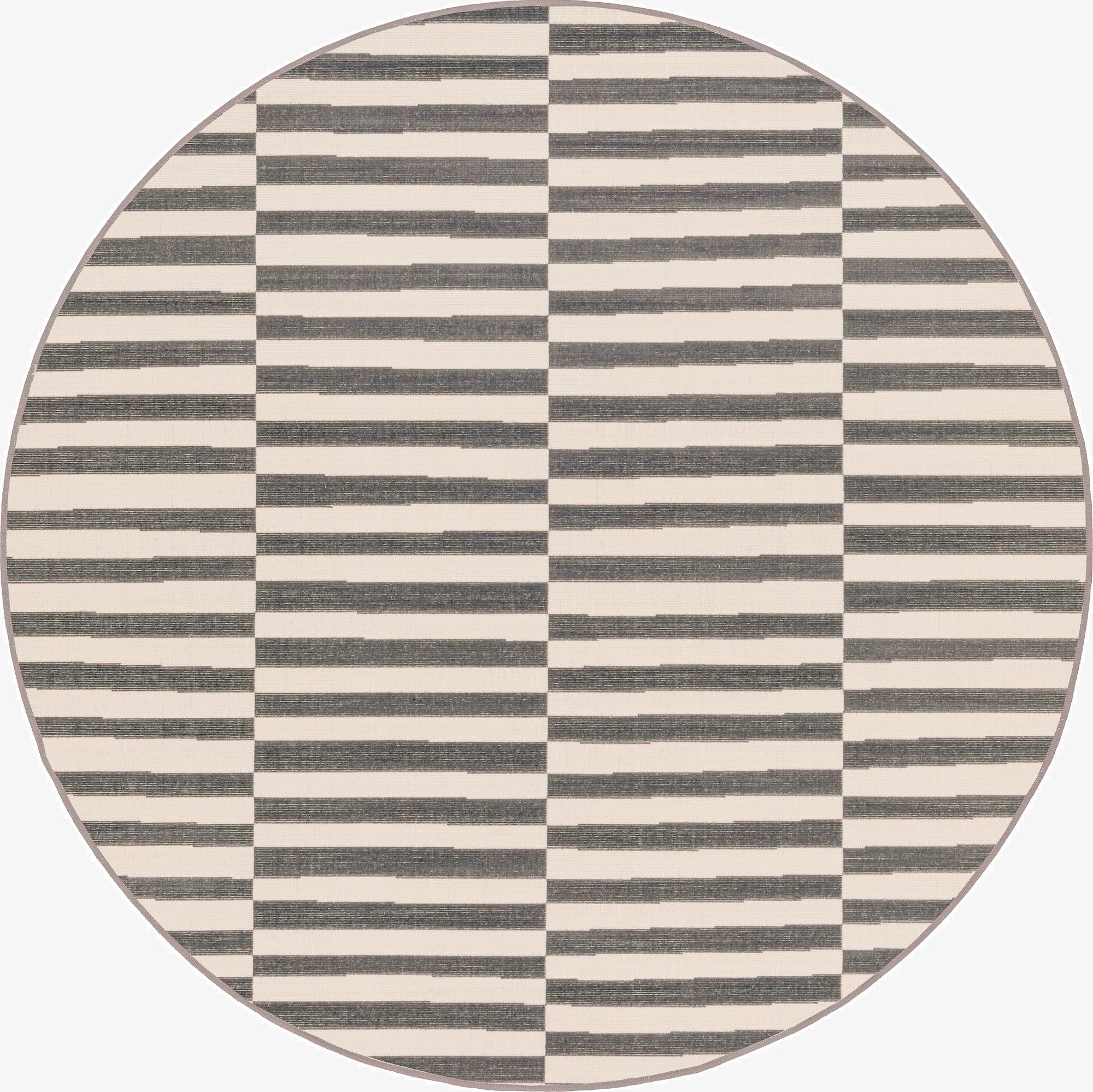 A round 3' 7 x 3' 7 gray and ivory striped rug with a modern geometric pattern, suitable for various indoor spaces.