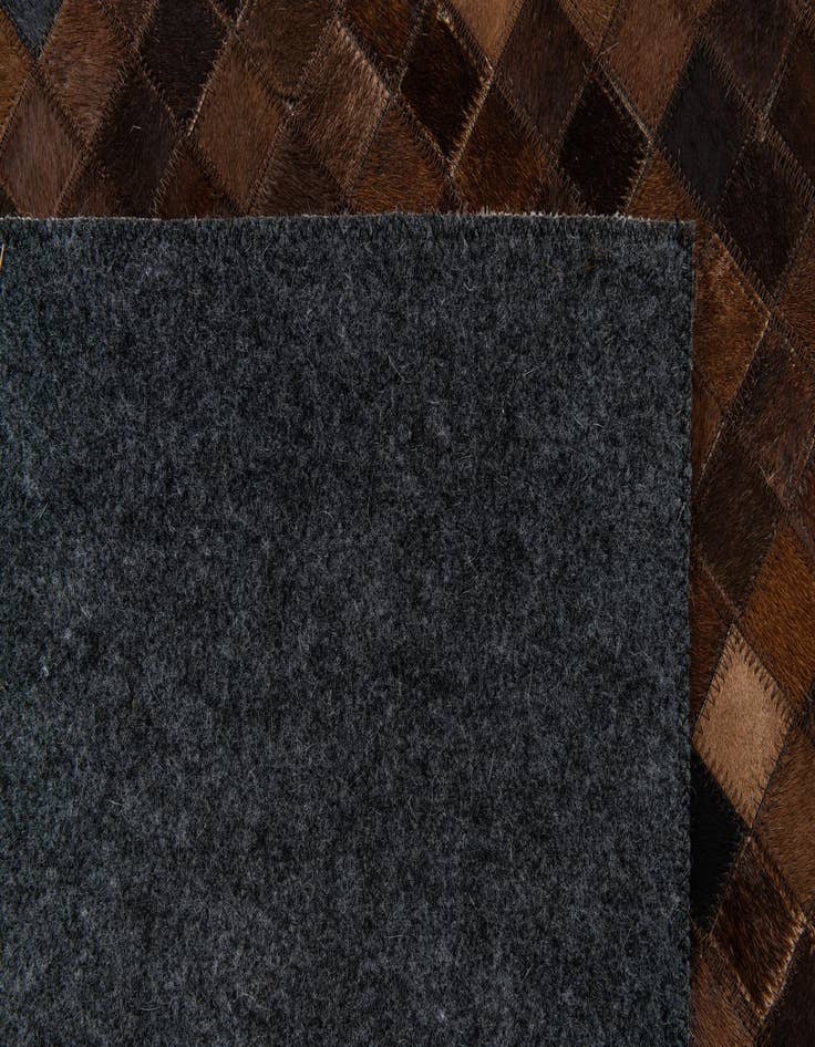 Detail image of 5' 1 x 8' Cowhide Stocks Rug
