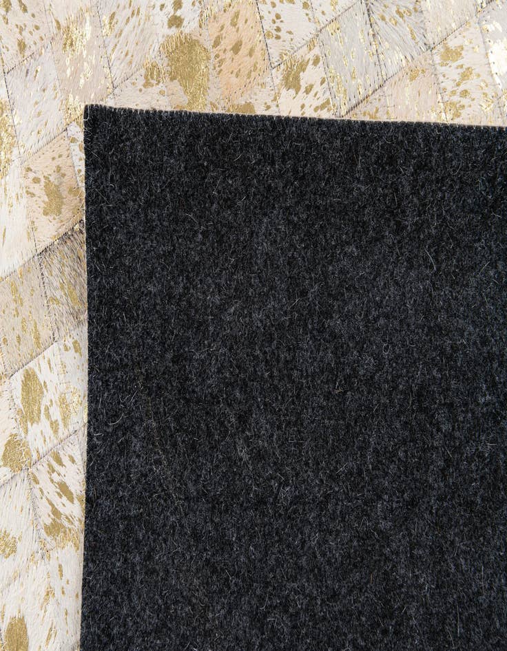 Detail image of 5' x 7' 11 Cowhide Stocks Rug