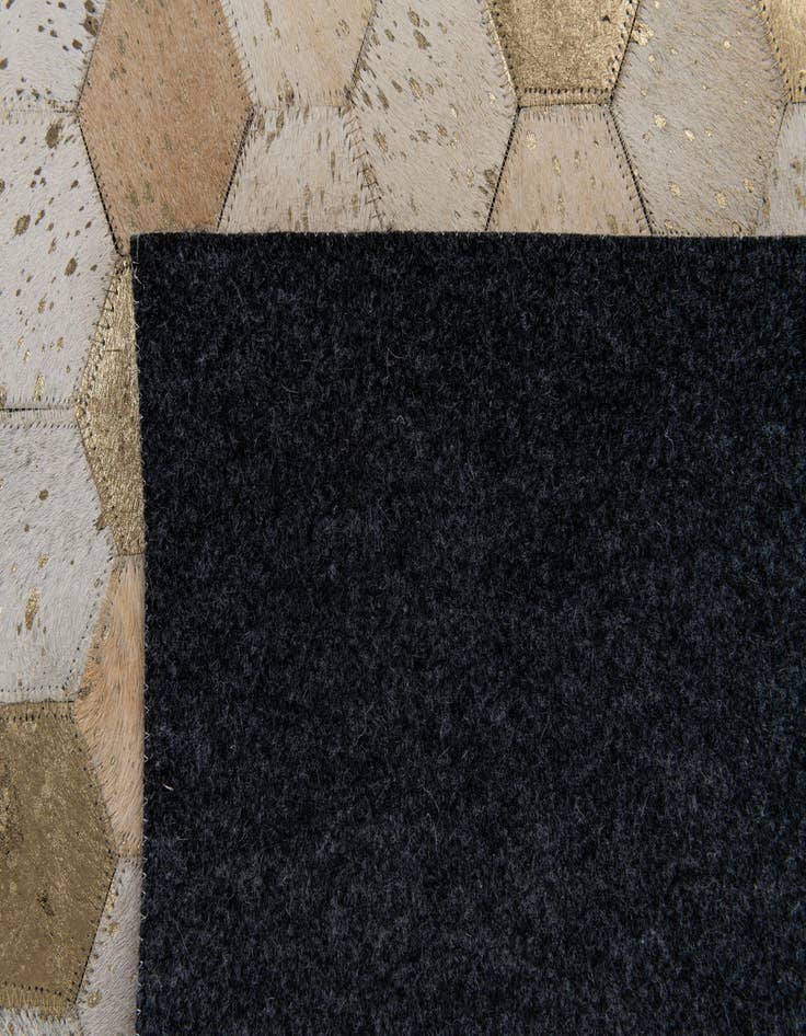 Detail image of 4' 10 x 7' 5 Cowhide Stocks Rug