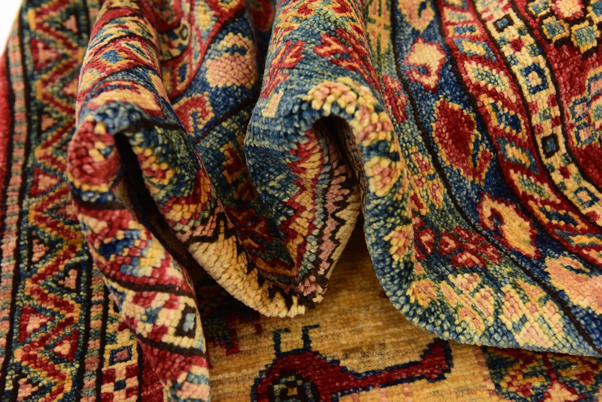 6' x 8' 3 Hand Knotted Kazak Rug
