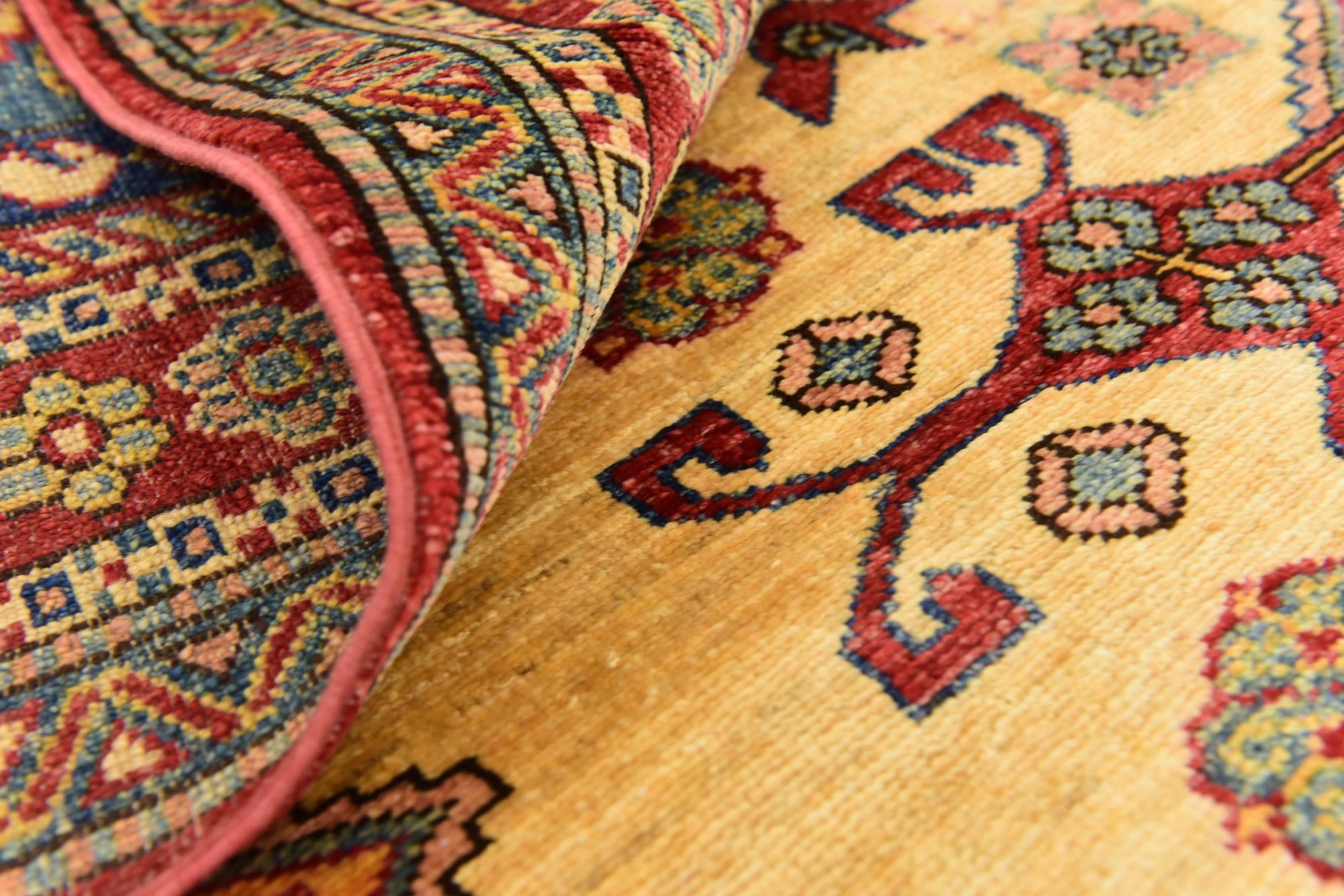 6' x 8' 3 Hand Knotted Kazak Rug