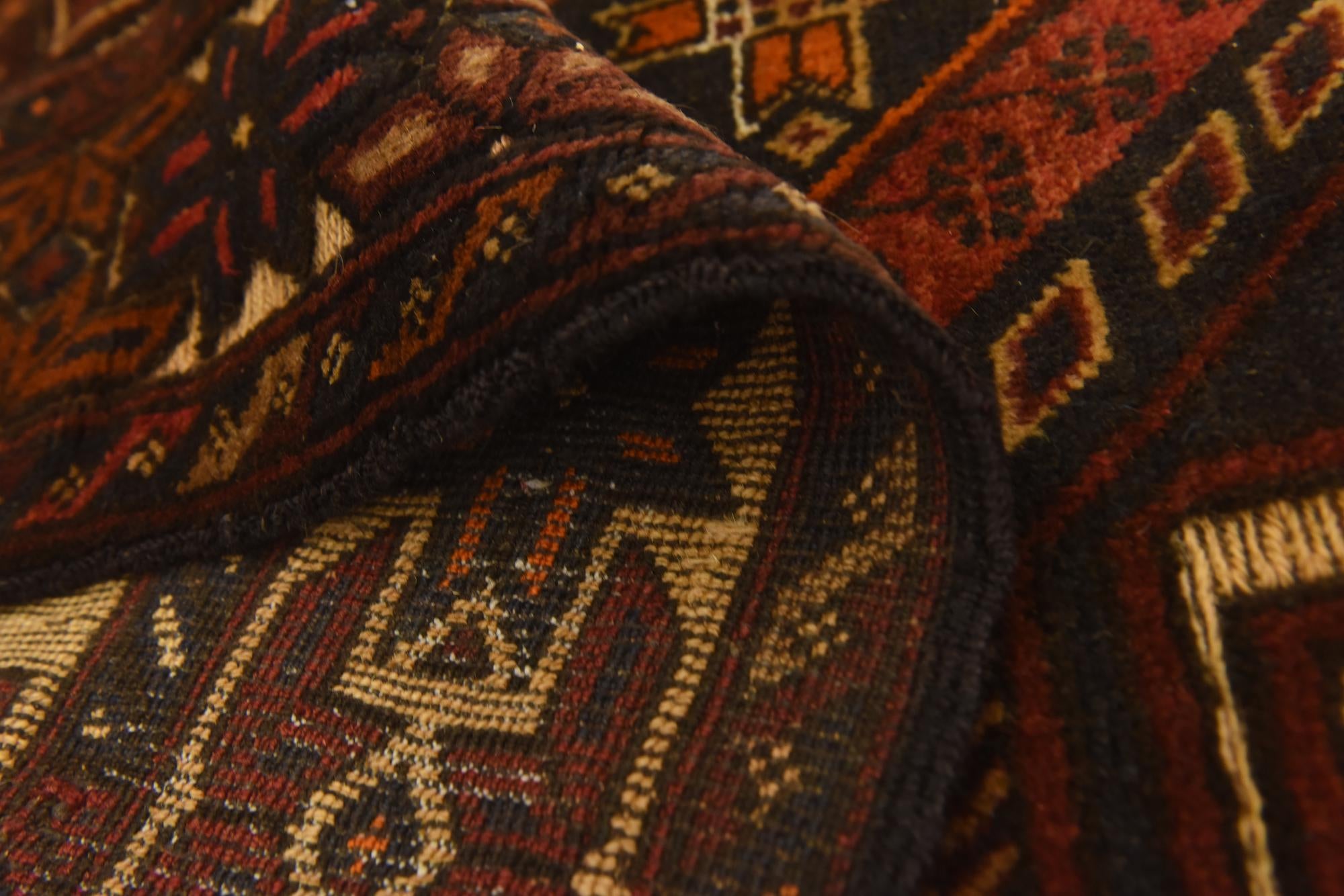 4' 1 x 6' 9 Hand Knotted Sumak Wool Rug