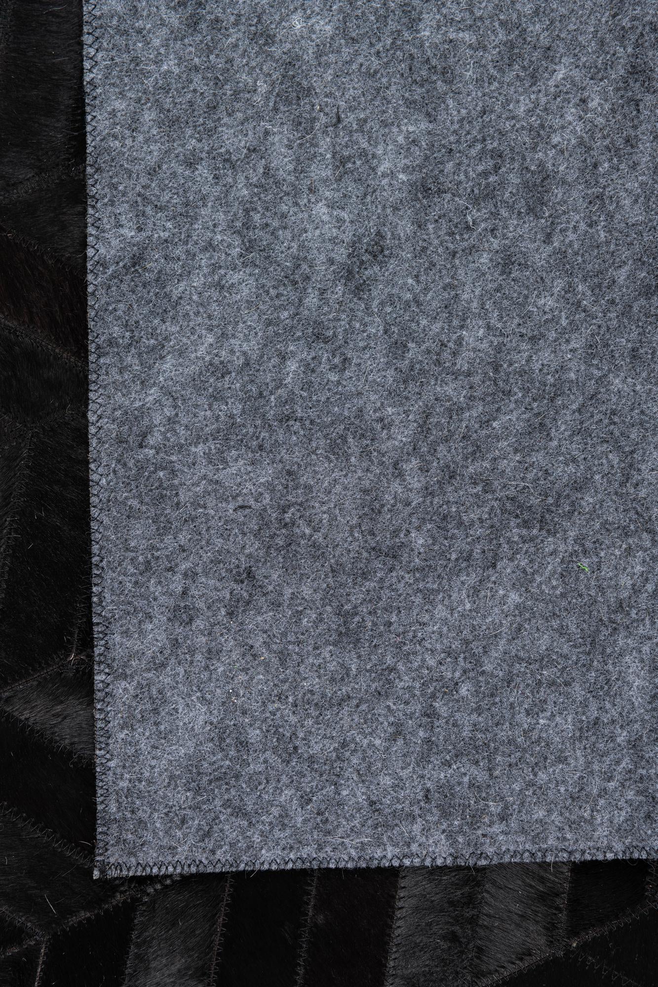 5' 1 x 8' Cowhide Leather Rug