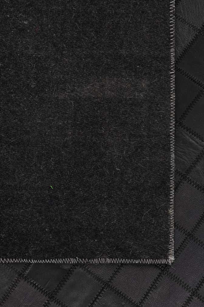 5' 1 x 7' 5 Cowhide Leather Rug