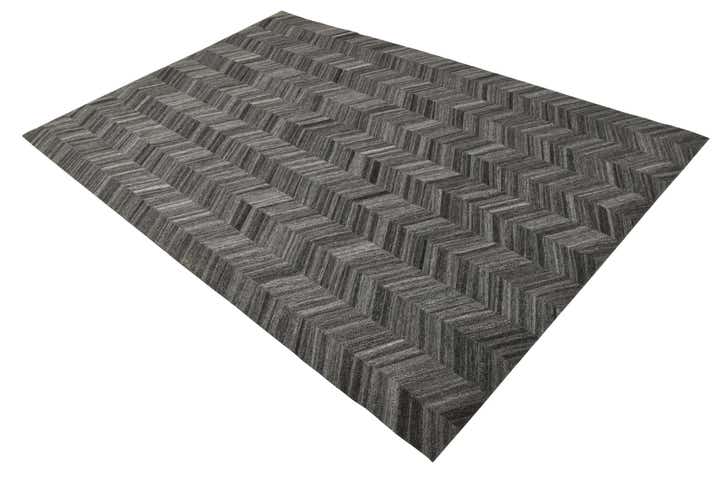 5' 4 x 8' 1 Cowhide Rug