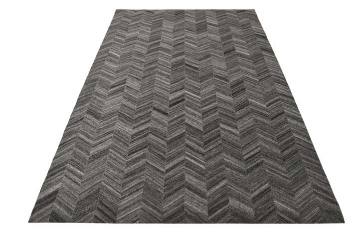 5' 4 x 8' 1 Cowhide Rug