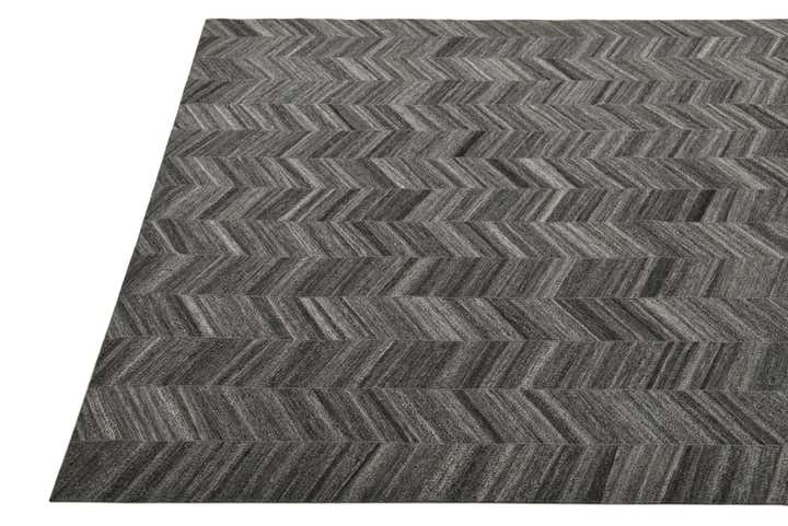 5' 4 x 8' 1 Cowhide Rug