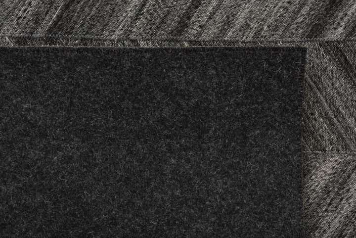 5' 4 x 8' 1 Cowhide Rug