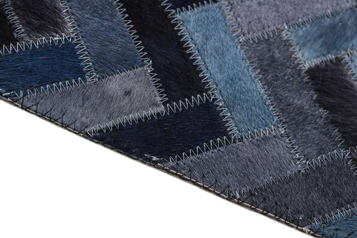 5' 1 x 8' Cowhide Rug