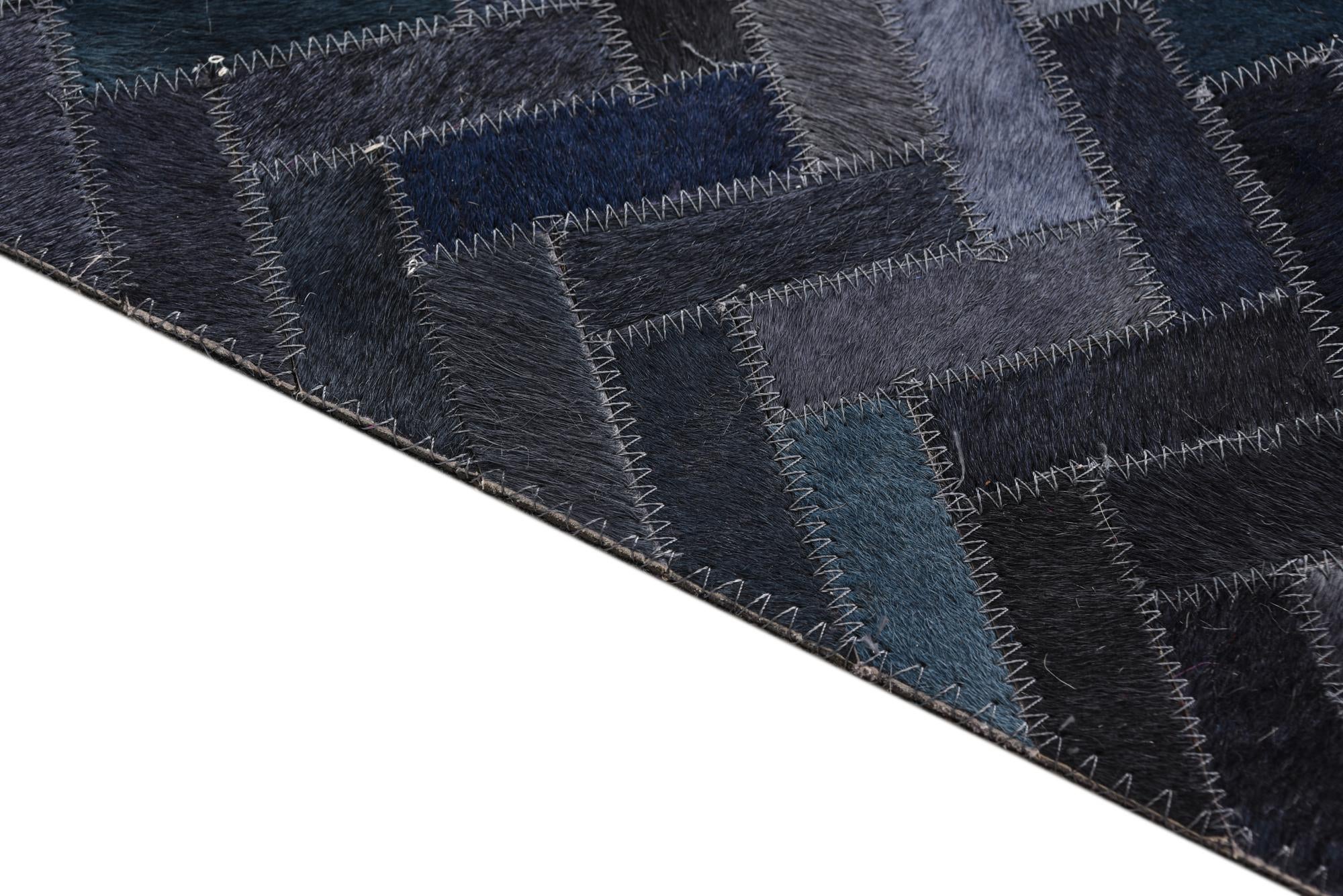 5' 2 x 8' Cowhide Rug