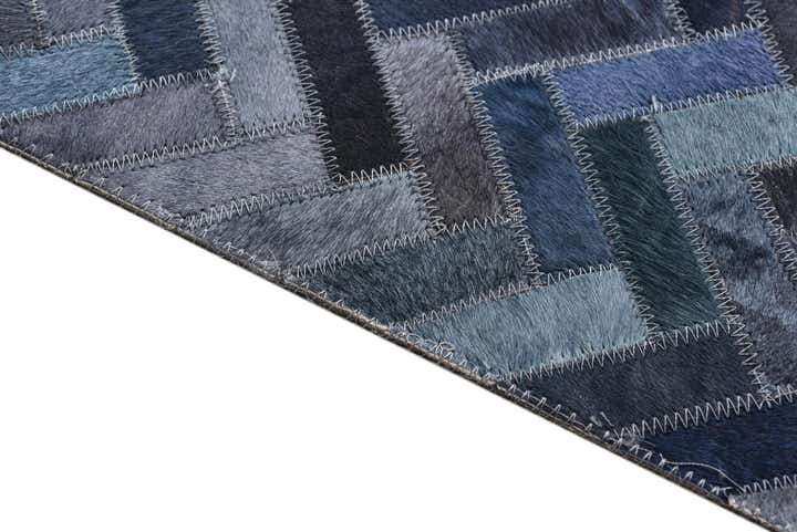 5' 2 x 8' Cowhide Rug