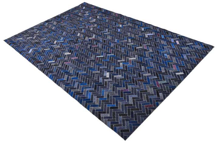 5' 2 x 7' 10 Cowhide Rug