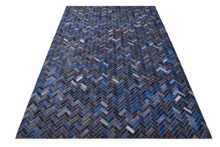 5' 2 x 7' 10 Cowhide Rug