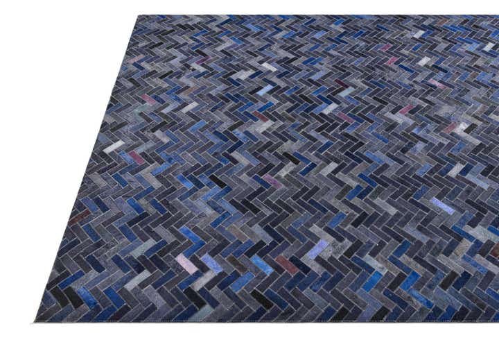 5' 2 x 7' 10 Cowhide Rug
