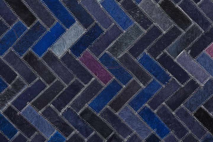 5' 2 x 7' 10 Cowhide Rug
