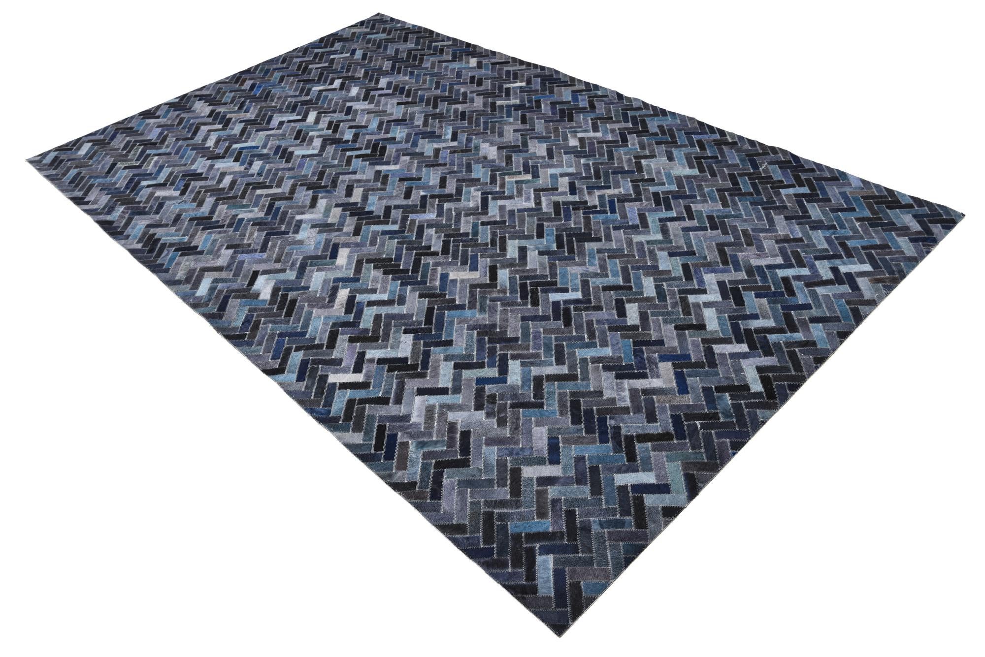 5' 2 x 8' 1 Cowhide Rug