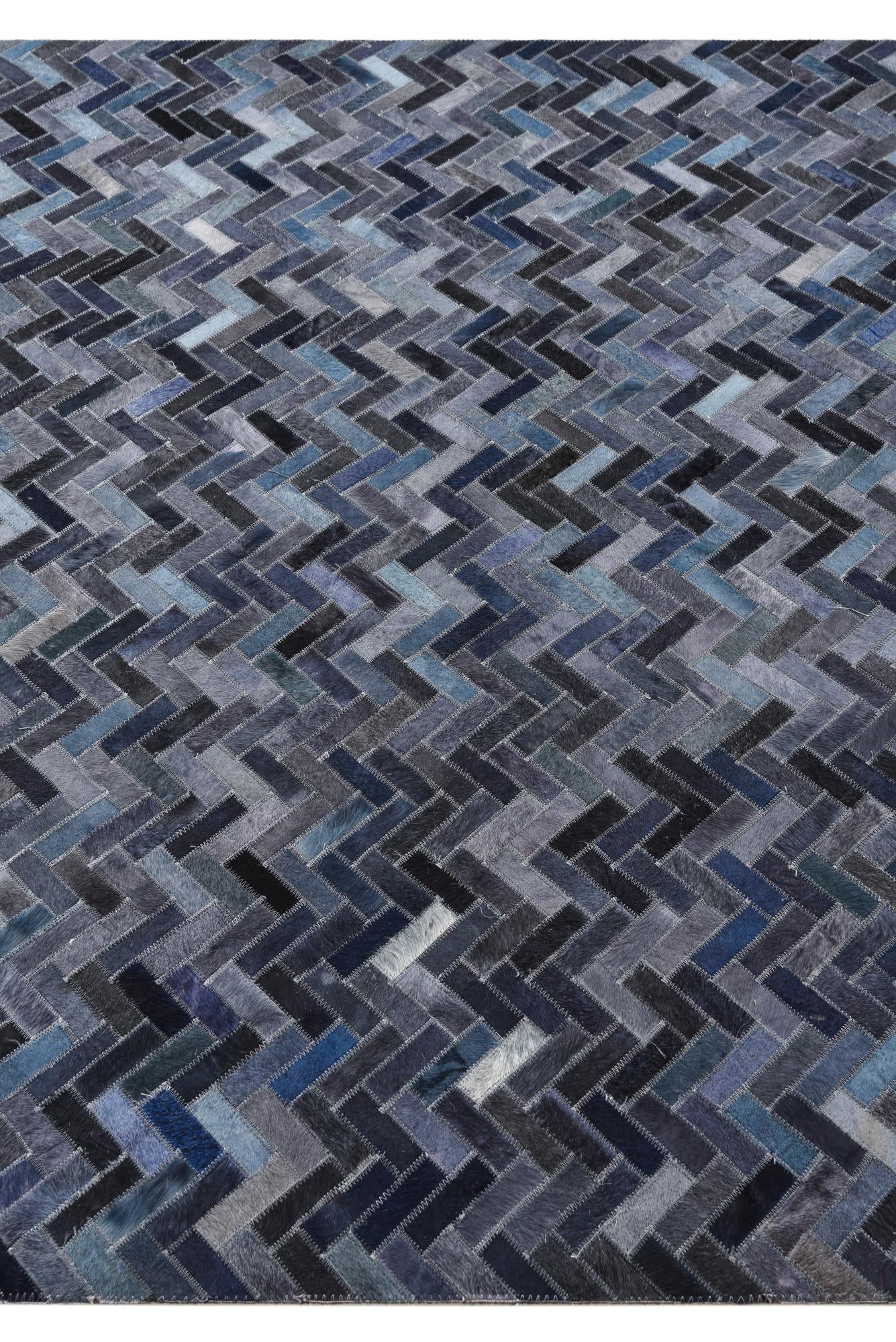 5' 2 x 8' 1 Cowhide Rug