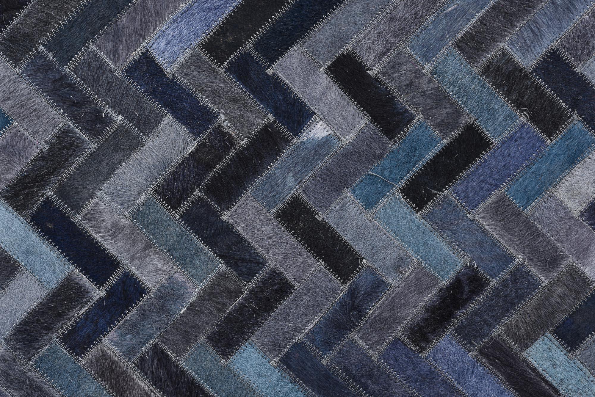 5' 2 x 8' 1 Cowhide Rug