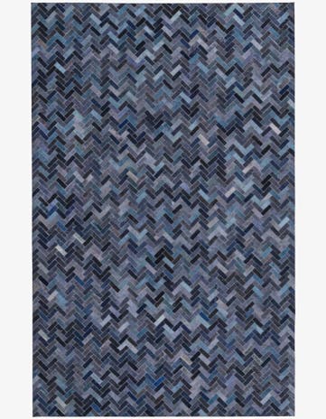 5' 2 x 8' 1 Cowhide Rug