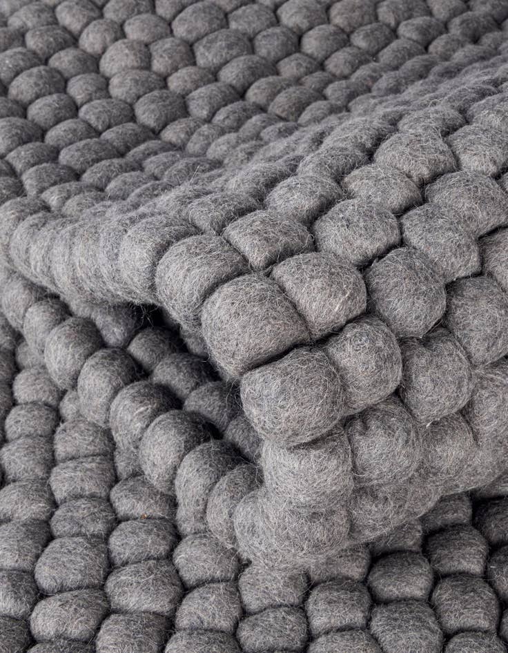 Detail image of 2' 2 x 3' 7 Hand Woven Felt Ball Wool Hearth Rug