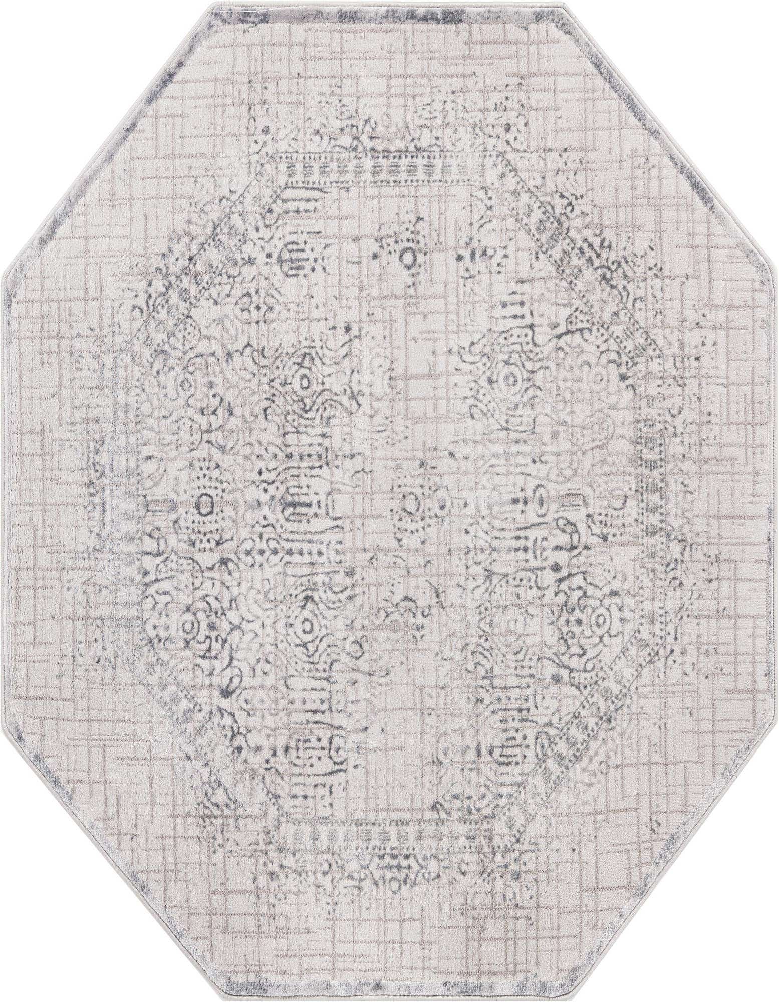 A 5' 3 x 5' 3 octagon rug in shades of gray and silver, featuring a distressed vintage medallion pattern.