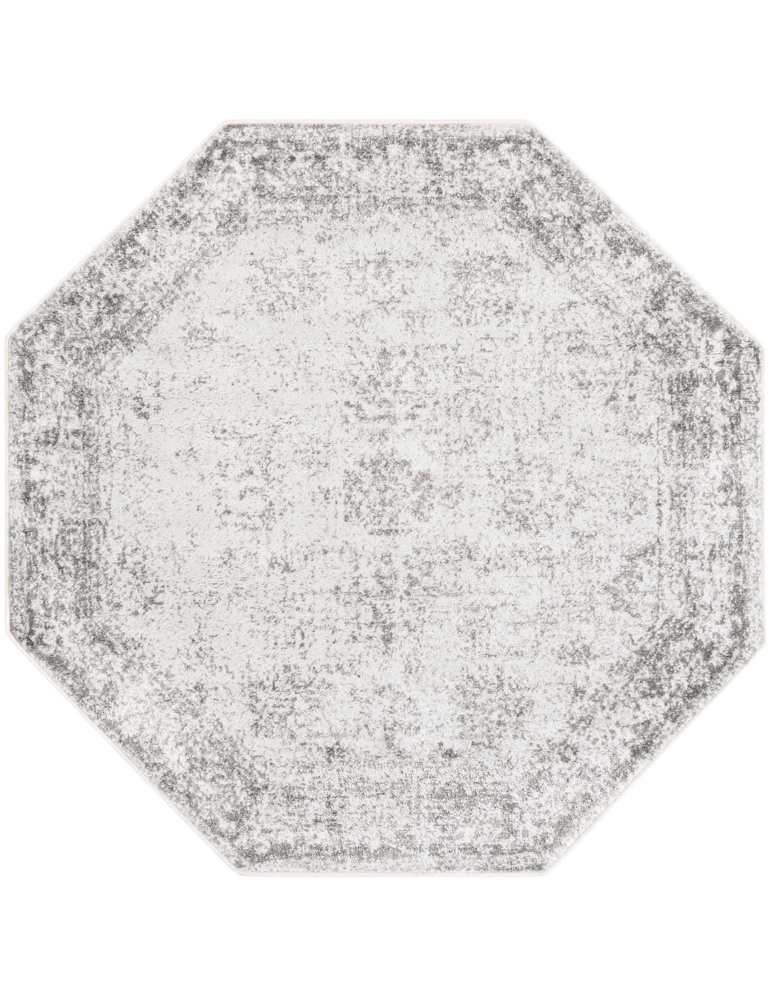 Octagon 5' 3 x 5' 3 gray and silver bohemian rug with a distressed medallion pattern, suitable for indoor use.