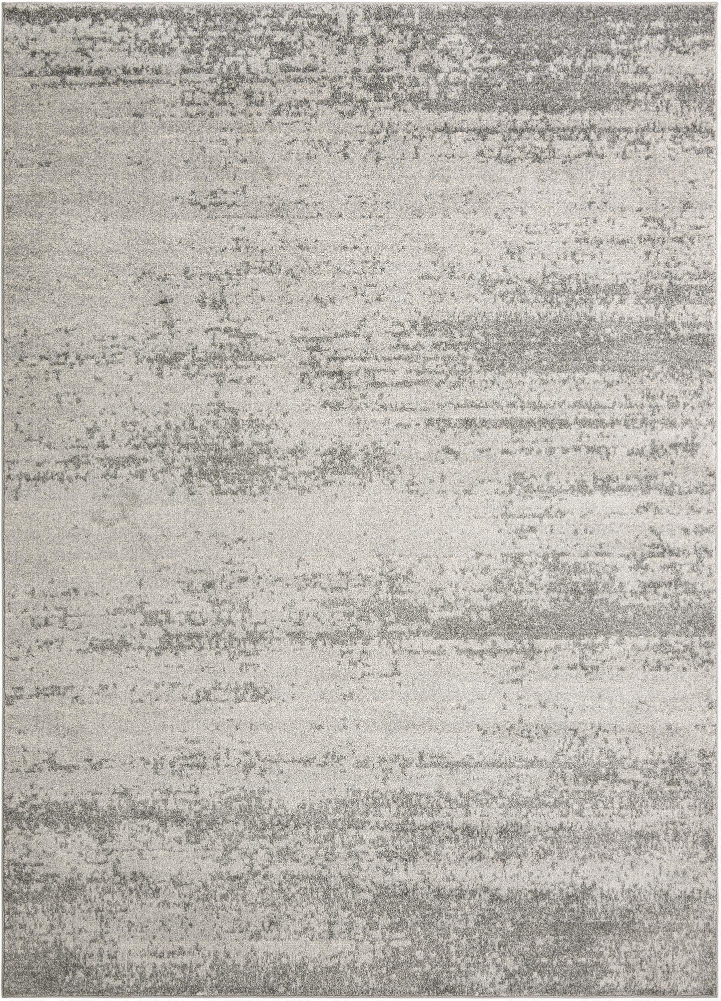 A rectangular 8x11 gray and silver area rug with a contemporary distressed, solid pattern, ideal for a living room.