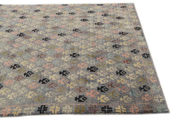 5' 7 x 8' 3 Hand Knotted Balouch Wool Rug