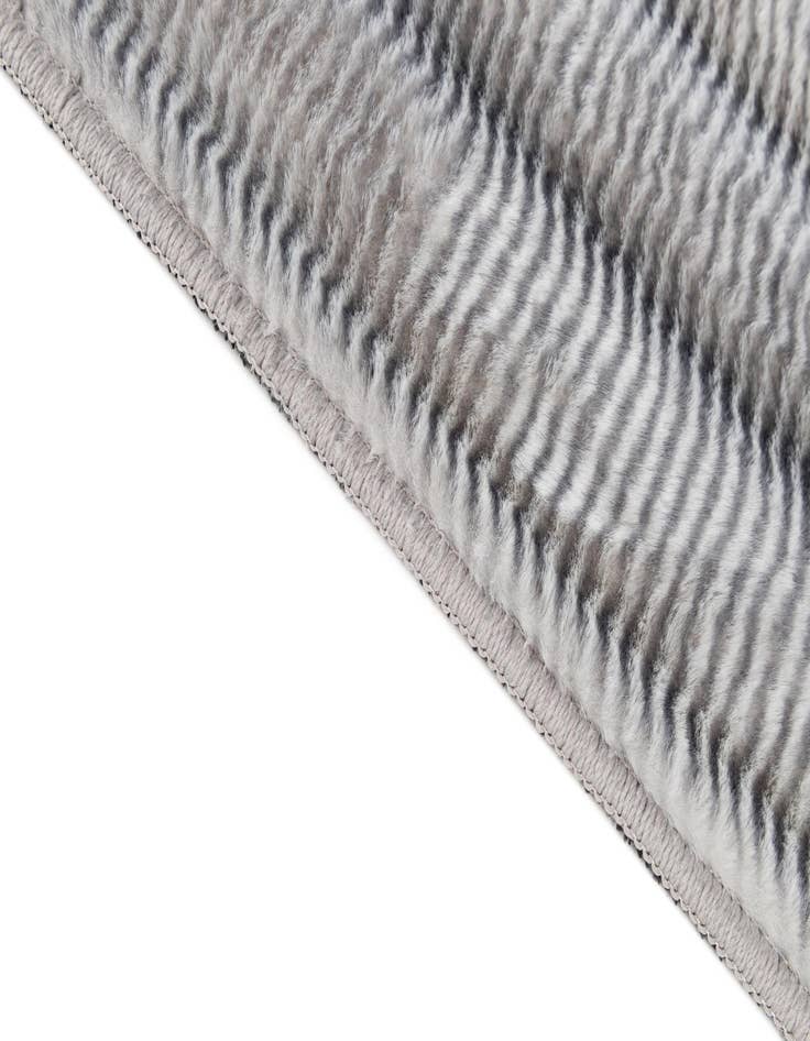 Detail image of 5' x 7' Carved Solid Rabbit Rug