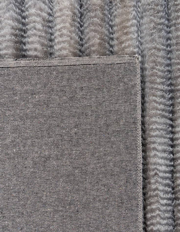 Detail image of 5' x 7' Carved Solid Rabbit Rug