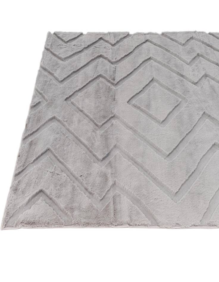 Detail image of 5' 1 x 7' Carved Solid Rabbit Rug