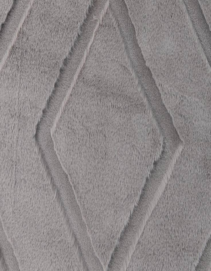 Detail image of 5' 1 x 7' Carved Solid Rabbit Rug