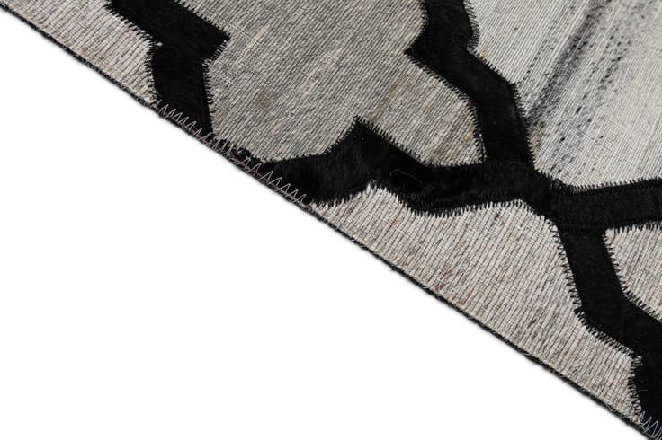 Detail image of 8' 1 x 9' 10 Cowhide - Patchwork Rug
