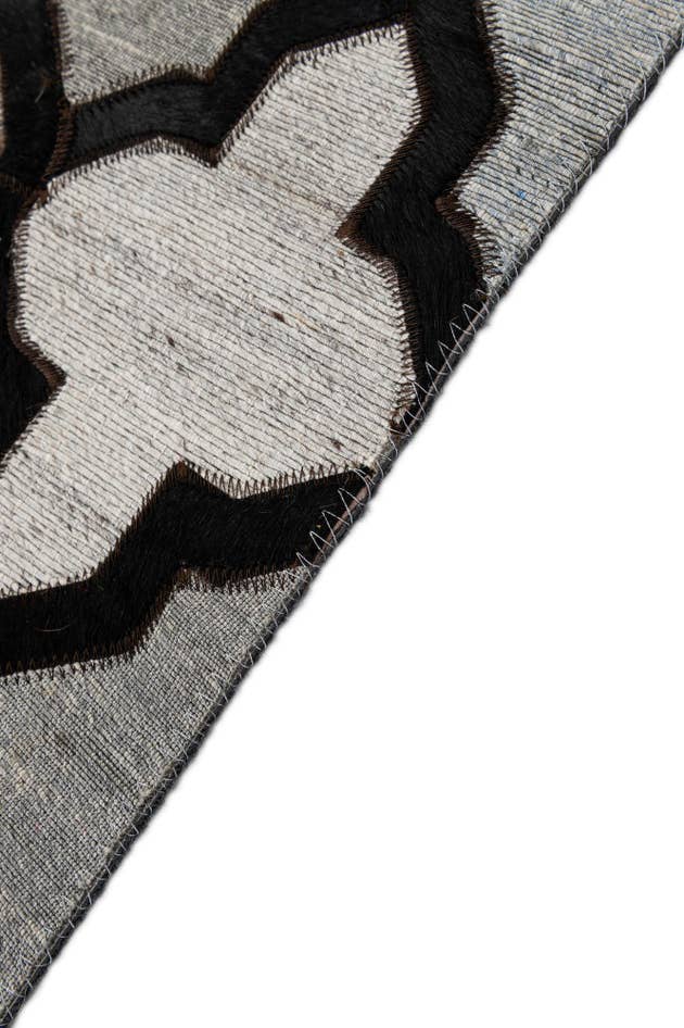 Detail image of 8' 1 x 9' 11 Cowhide - Patchwork Rug
