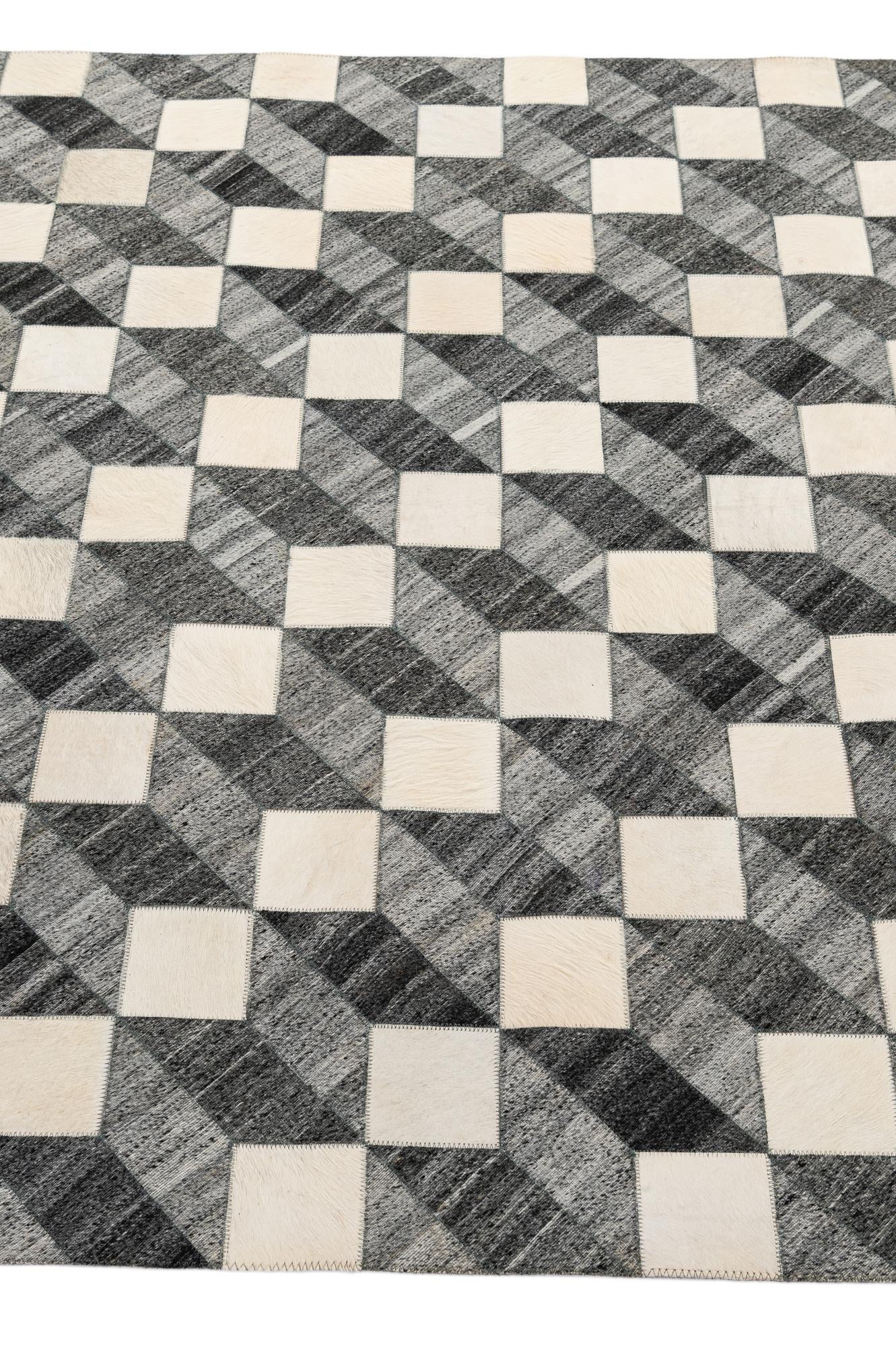 4' 11 x 7' 9 Cowhide - Patchwork Rug