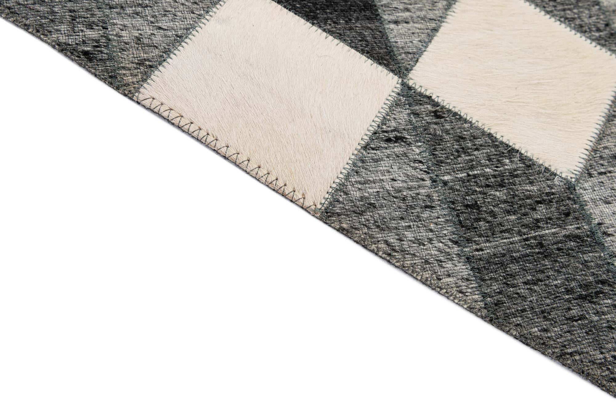 4' 11 x 7' 9 Cowhide - Patchwork Rug