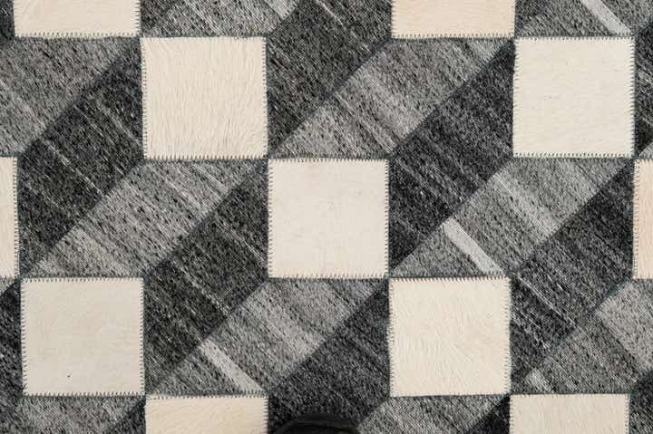 4' 11 x 7' 9 Cowhide - Patchwork Rug