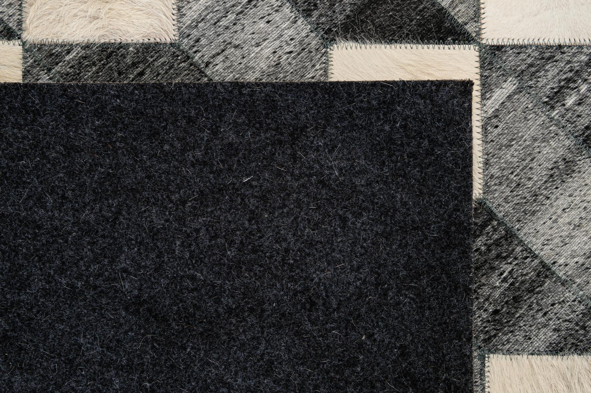 4' 11 x 7' 9 Cowhide - Patchwork Rug