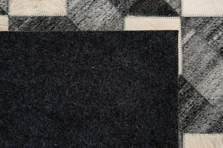 4' 11 x 7' 9 Cowhide - Patchwork Rug