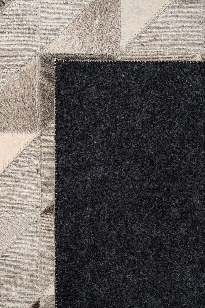 4' 10 x 7' 8 Cowhide - Patchwork Rug