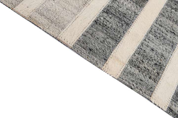 4' 11 x 7' 11 Cowhide - Patchwork Rug