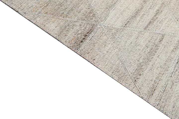 4' 11 x 7' 11 Cowhide - Patchwork Rug