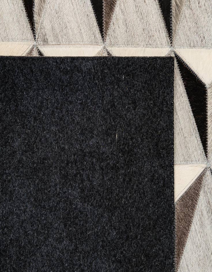 Detail image of 4' 11 x 7' 11 Cowhide - Patchwork Rug
