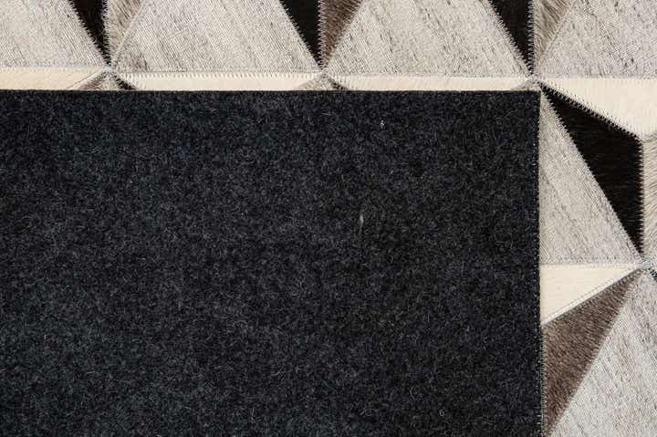 4' 11 x 7' 11 Cowhide - Patchwork Rug
