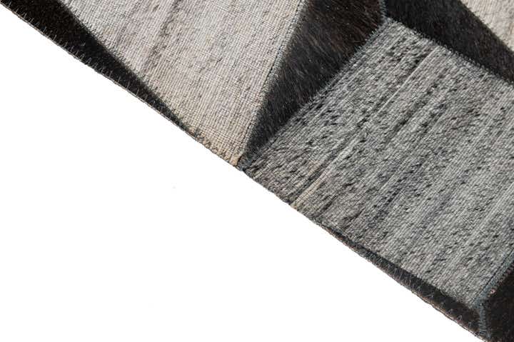 5' 2 x 8' 1 Cowhide - Patchwork Rug