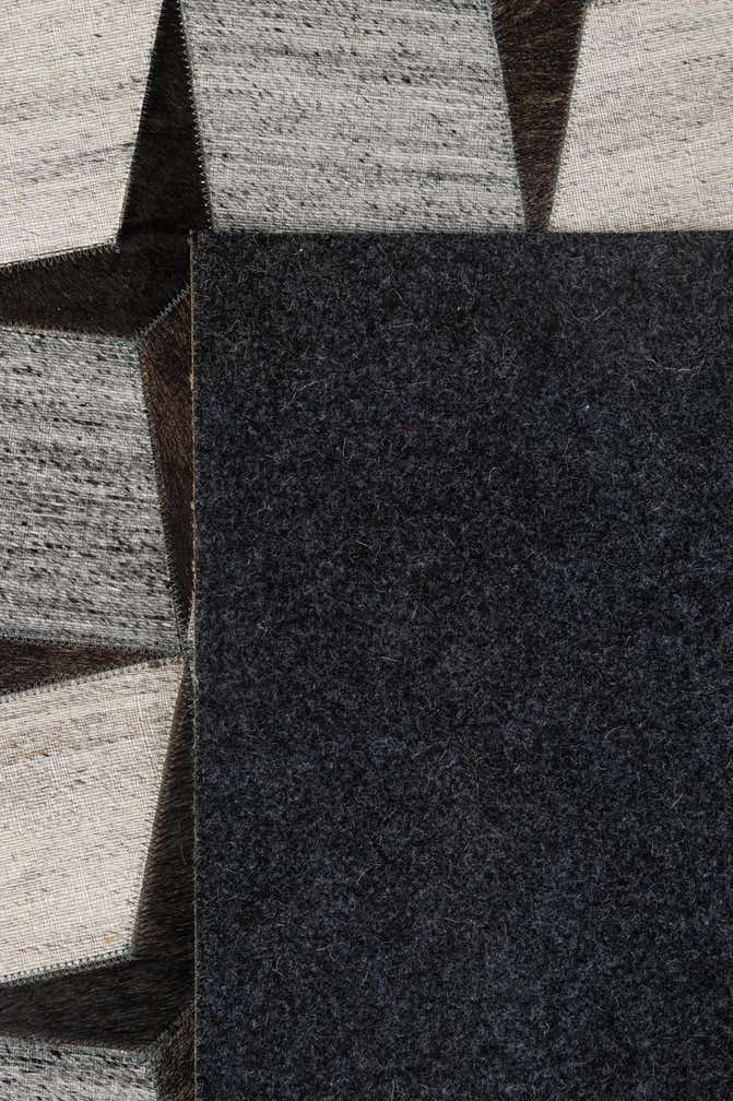 5' 2 x 8' 1 Cowhide - Patchwork Rug