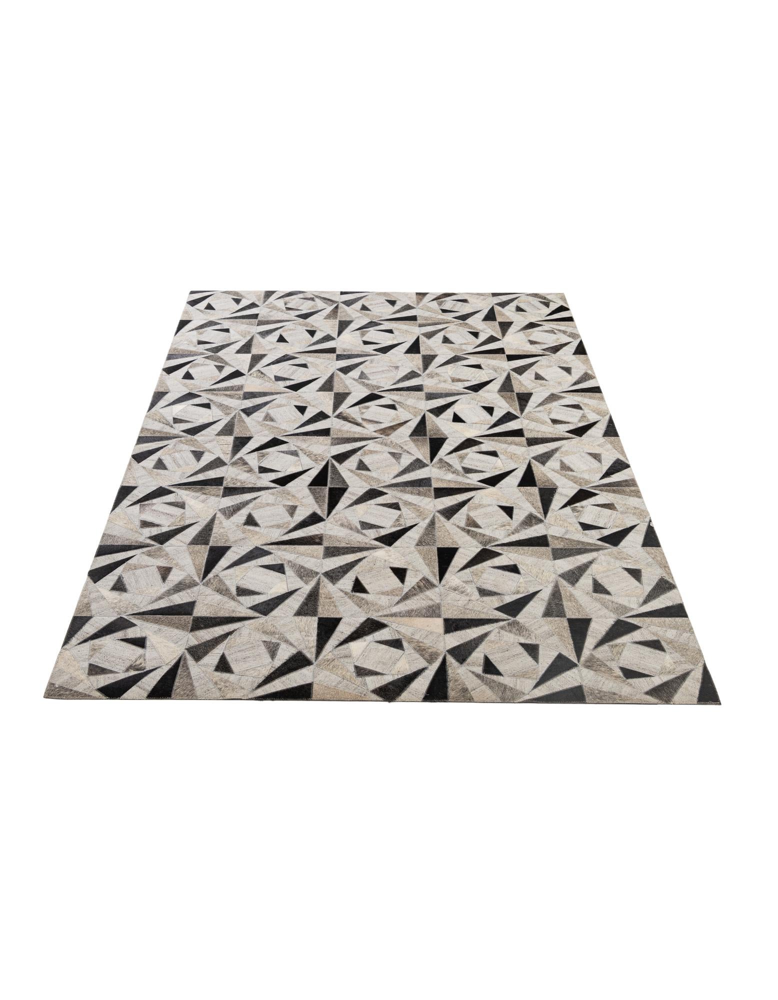 4' 11 x 7' 10 Cowhide - Patchwork Rug