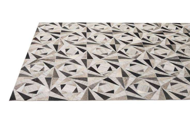Detail image of 4' 11 x 7' 10 Cowhide - Patchwork Rug